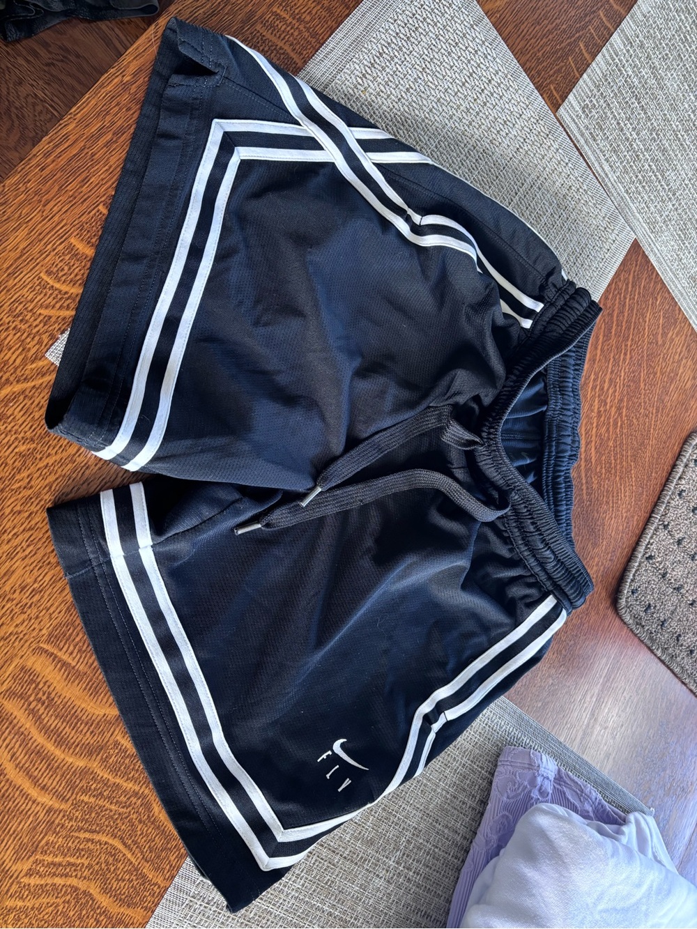 Nike Black Athletic Shorts with White Stripe Trim